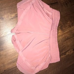 Pink lululemon running shorts (size 4)